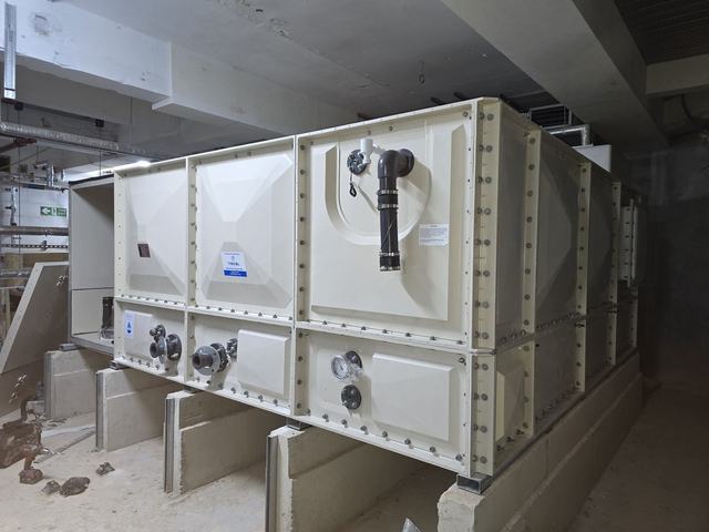 Large tank on plinths