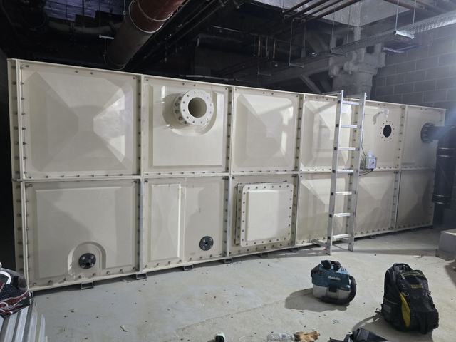 Two-panel-high tank in a basement